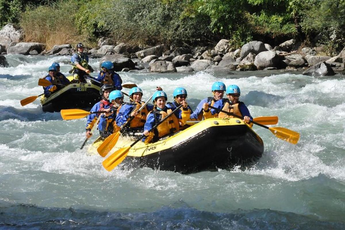 a group of people in a raft on a river