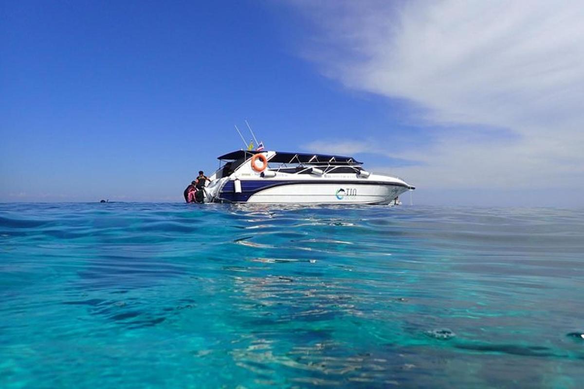 a white boat in the water in the ocean