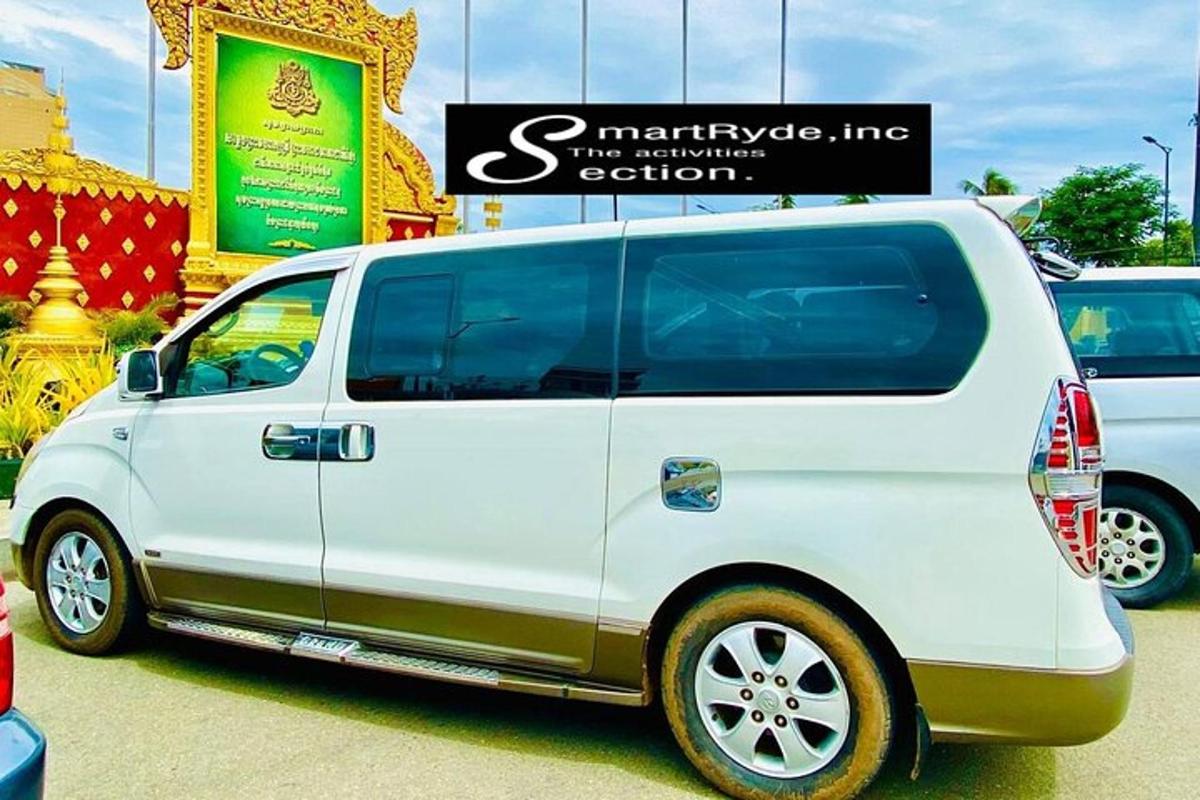 a white van parked in front of a store