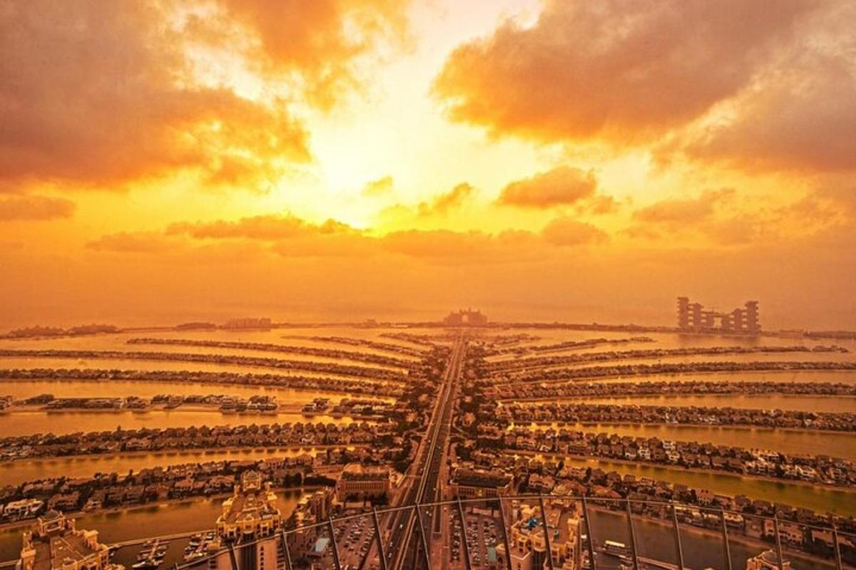 a large parking lot with a sunset in the background