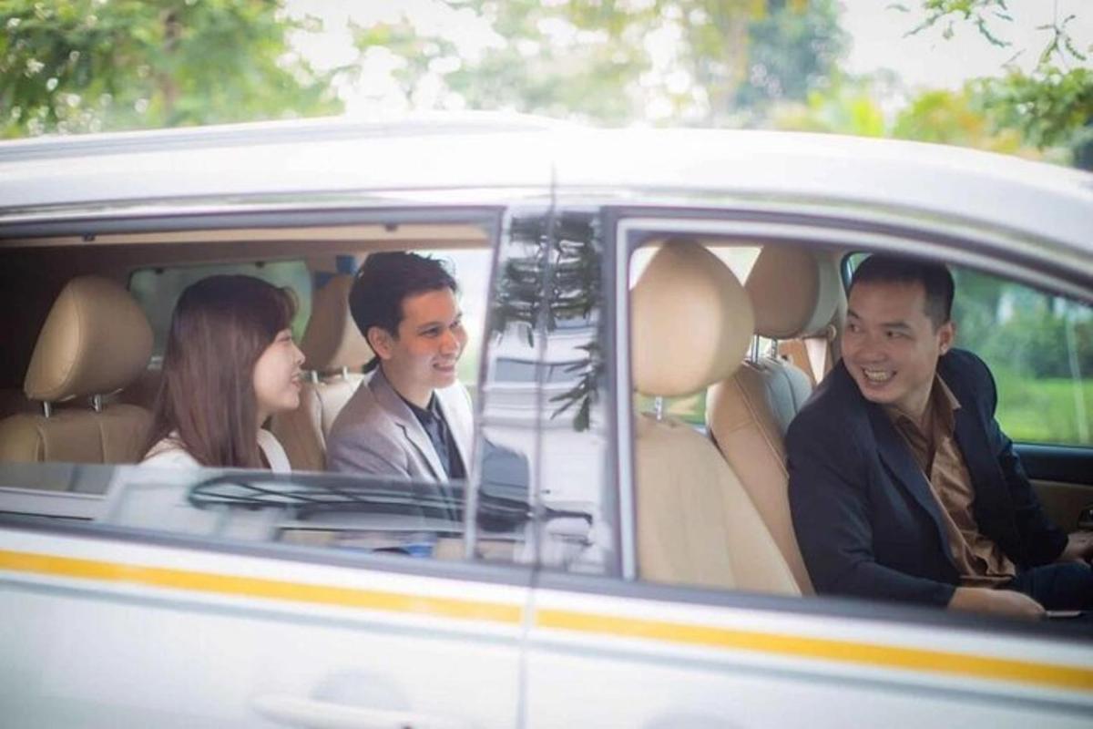 a group of people sitting in a car