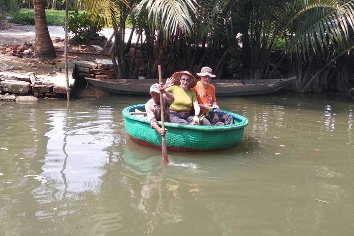 a group of people in a boat in the water
