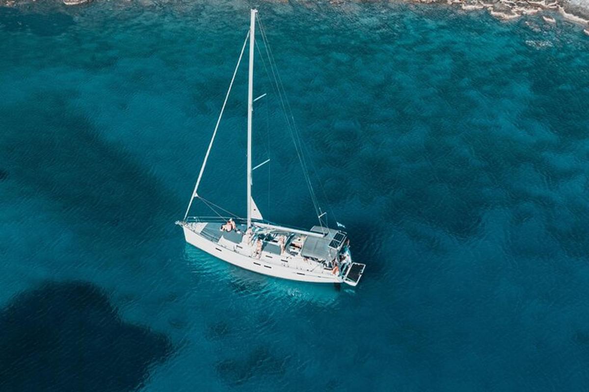 a boat floating in the water in the ocean
