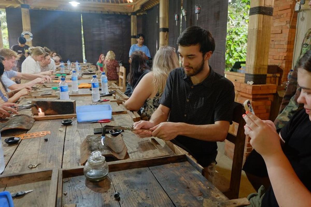 a group of people sitting around a wooden table