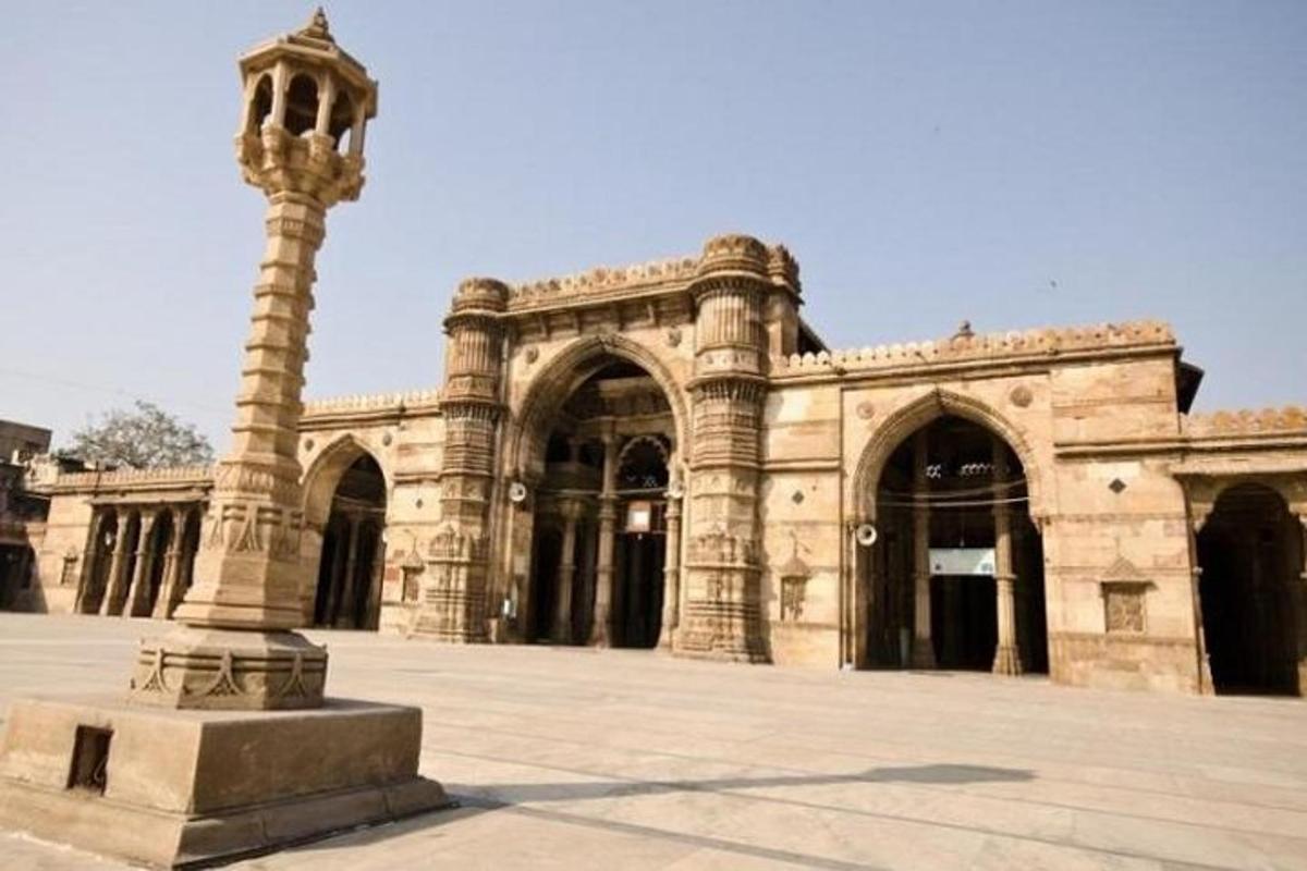 a large building with a street light in front of it