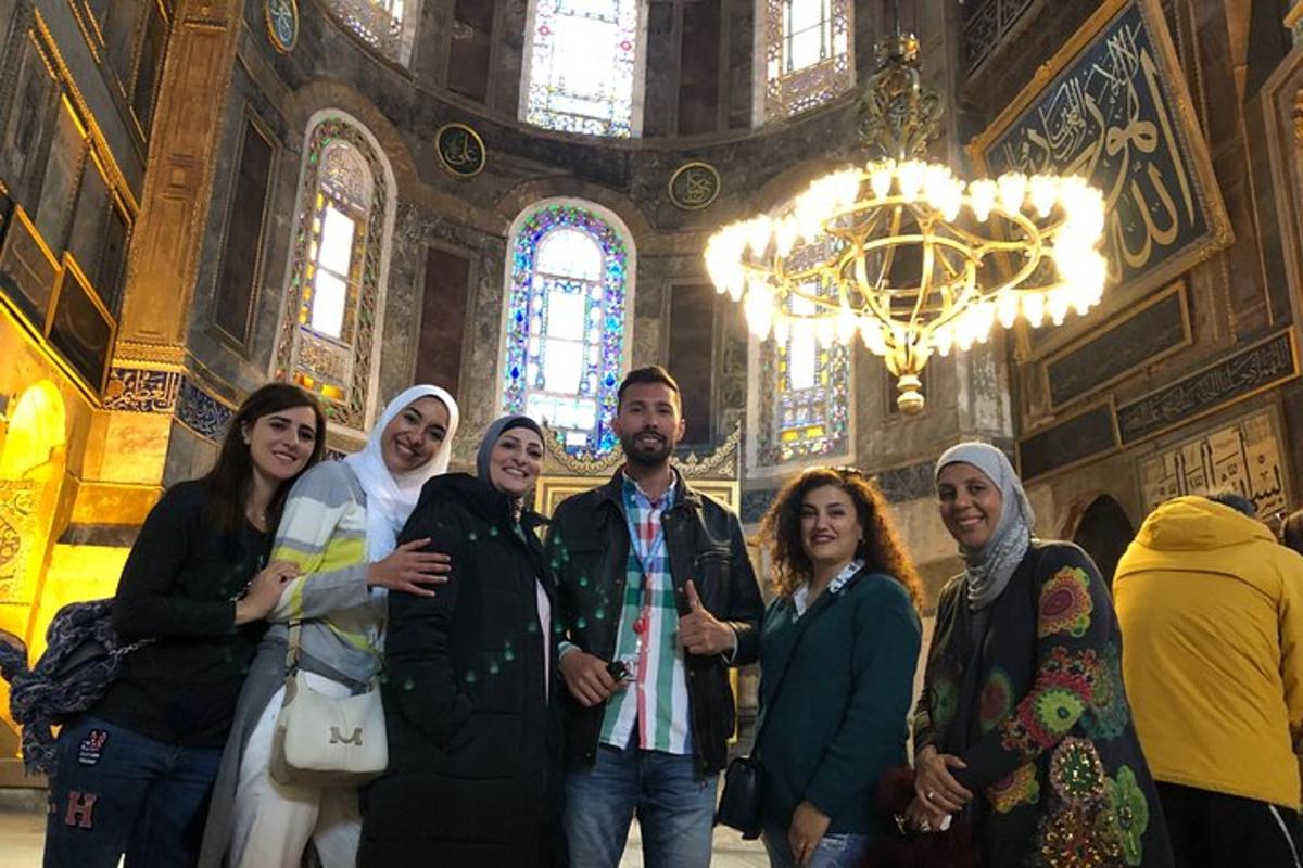 a group of people posing for a picture in a church