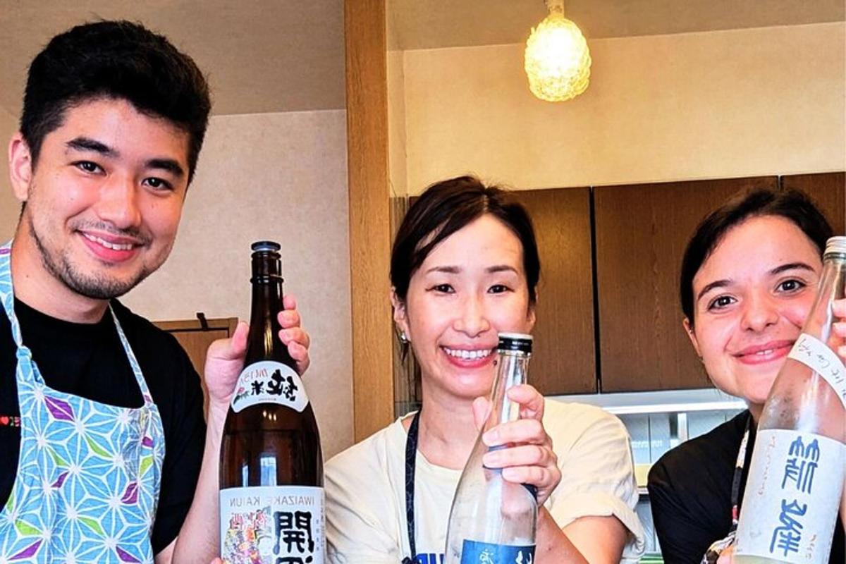 a group of three people holding up bottles of beer