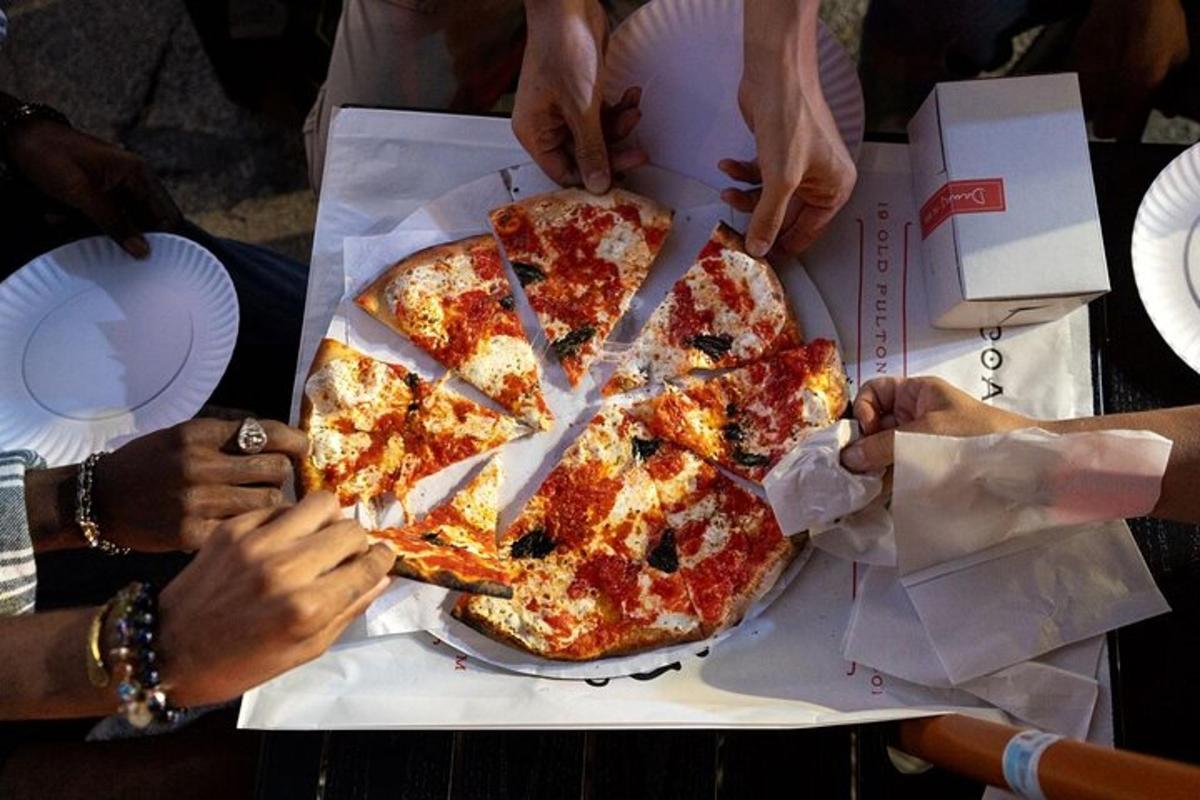 a pizza sitting on top of a table