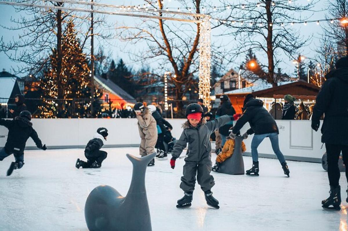 a group of children playing on an ice rink with a goose