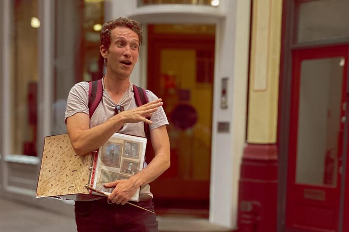 a man with a backpack is holding a box