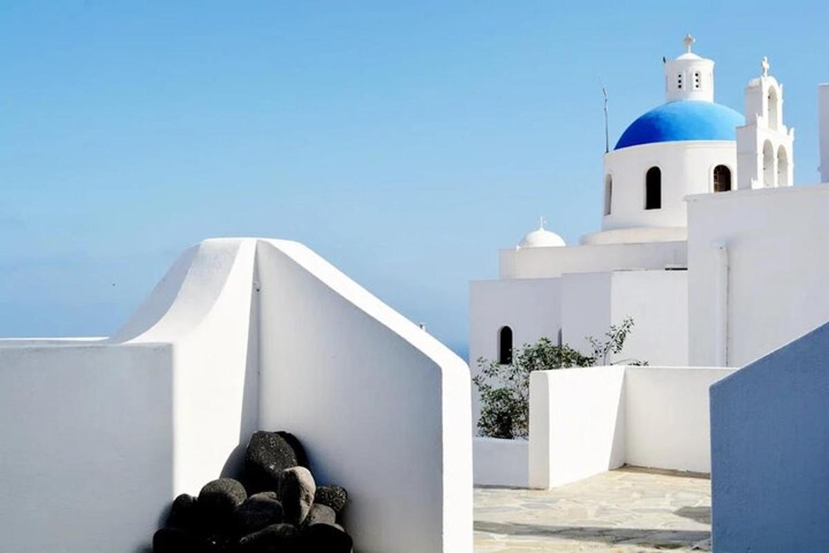 a view of a white building with a blue dome