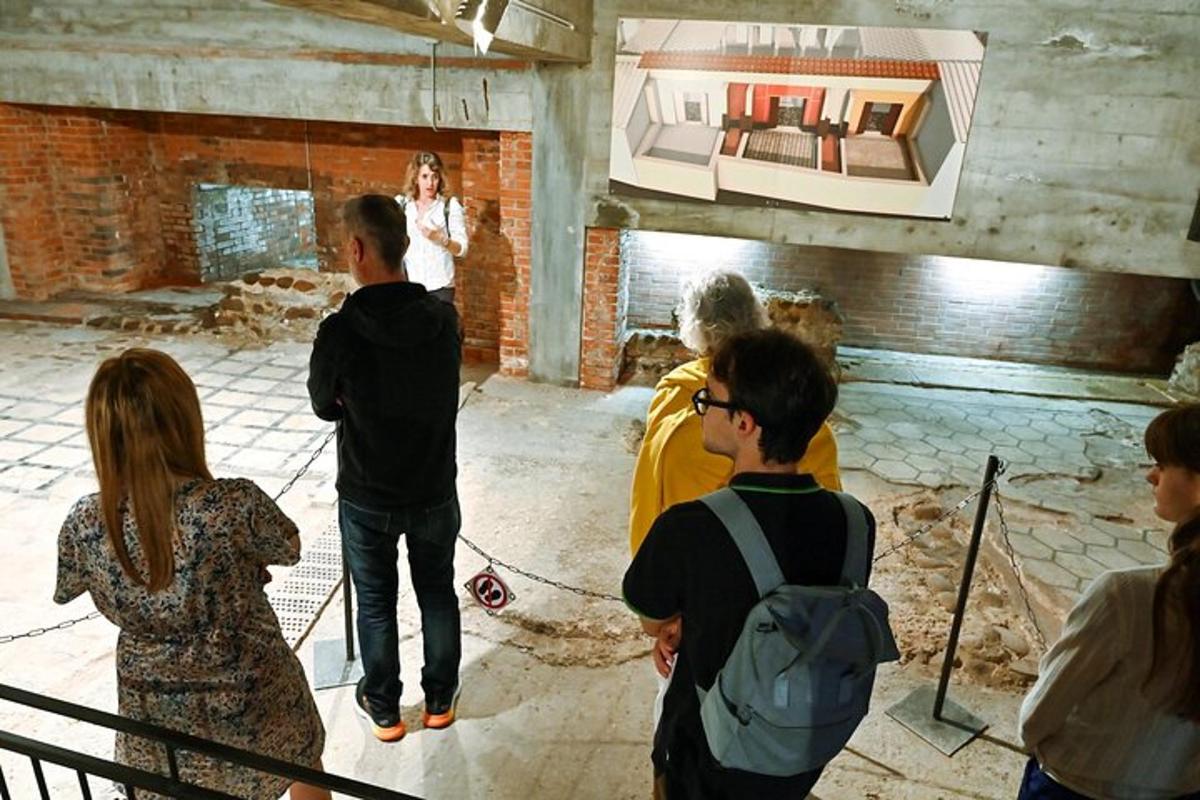a group of people standing around in a room
