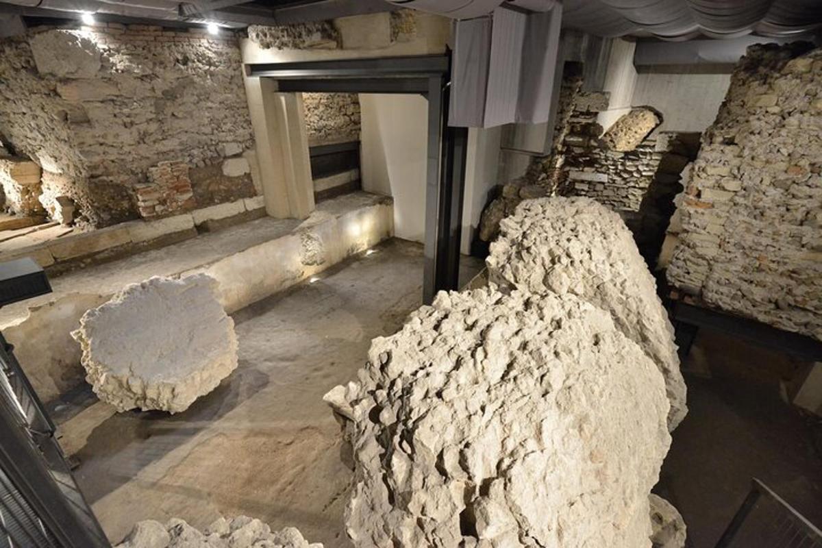 a room with a pile of rocks in a building