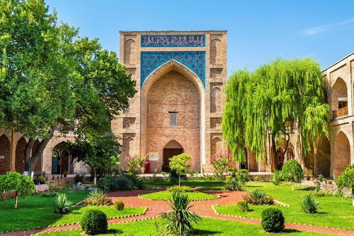 a building with a garden in front of it