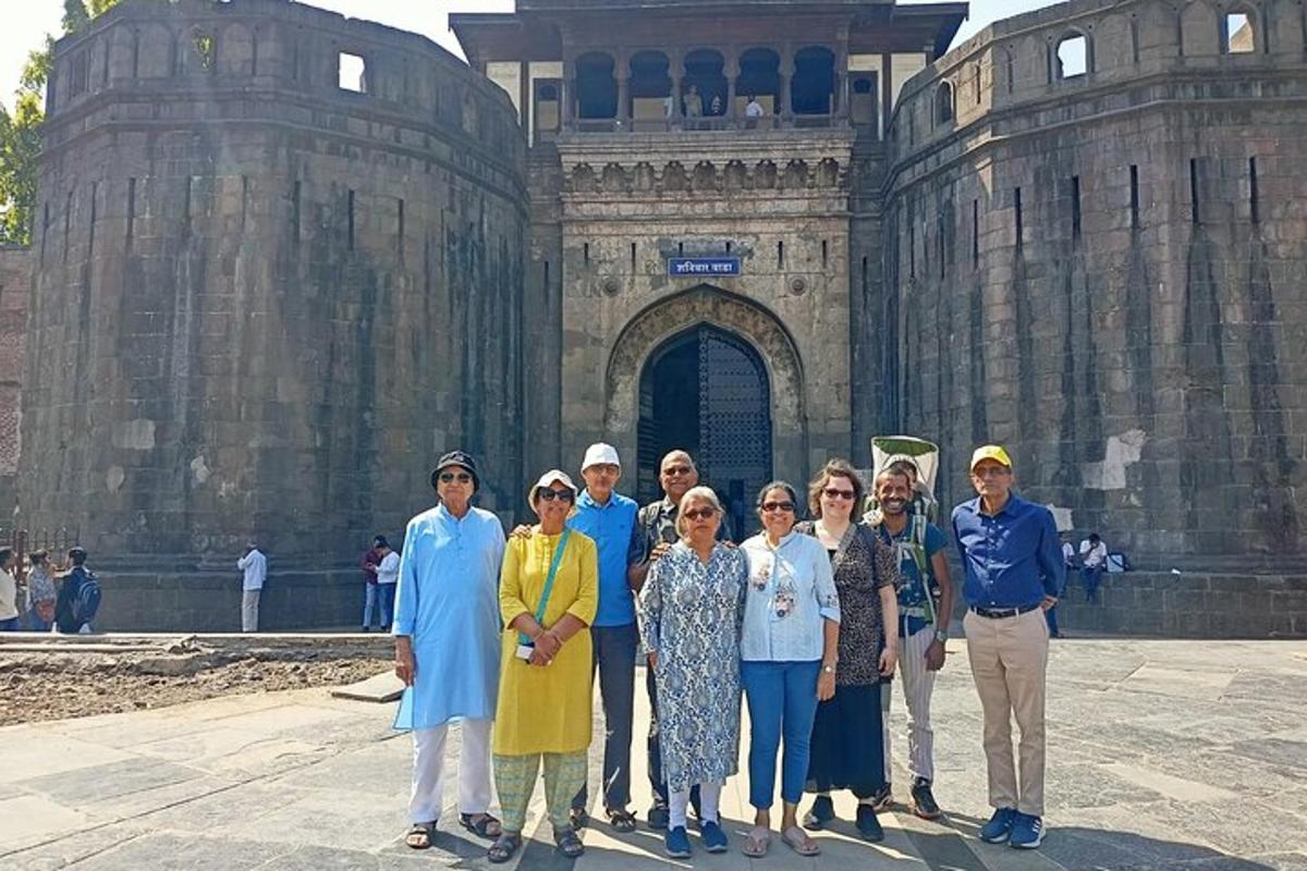 a group of people standing in front of a building
