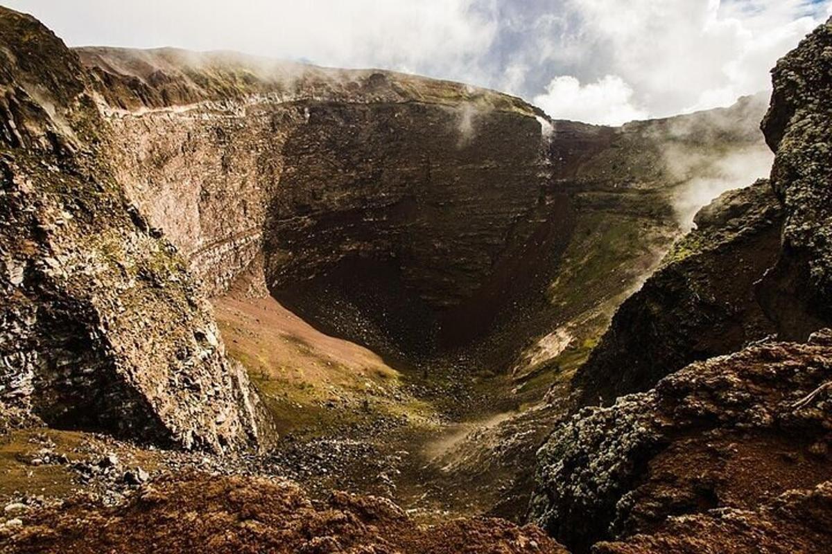 a view of a canyon with a mountain in the background