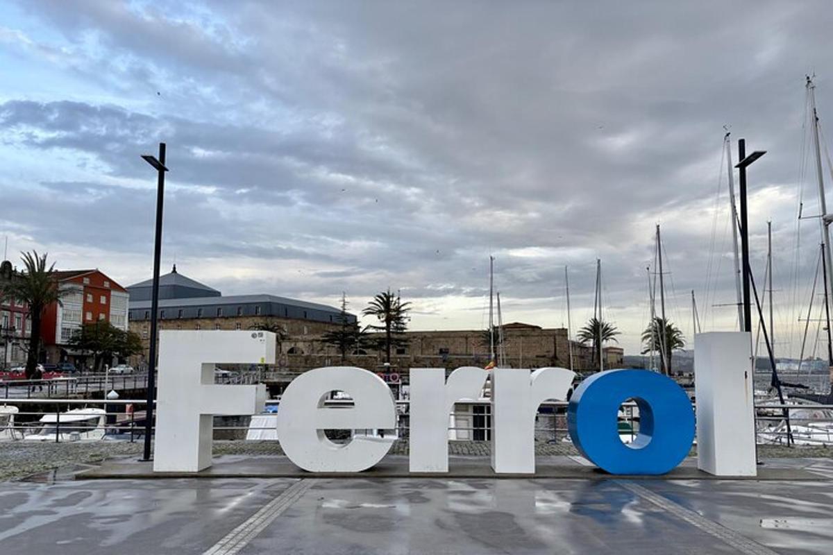 a large sign that says fear gate in a parking lot