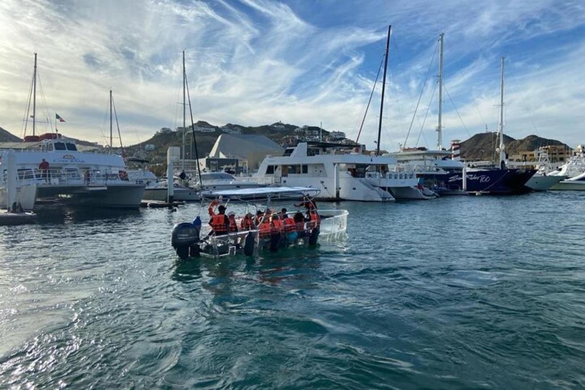 a group of people in a boat in the water