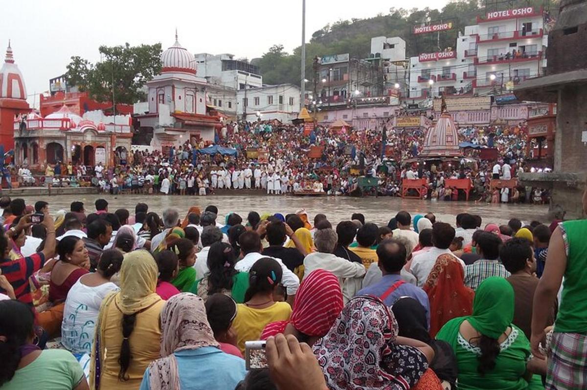 a large crowd of people watching a parade