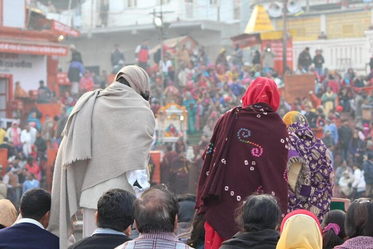 a group of people standing in a crowd at a festival
