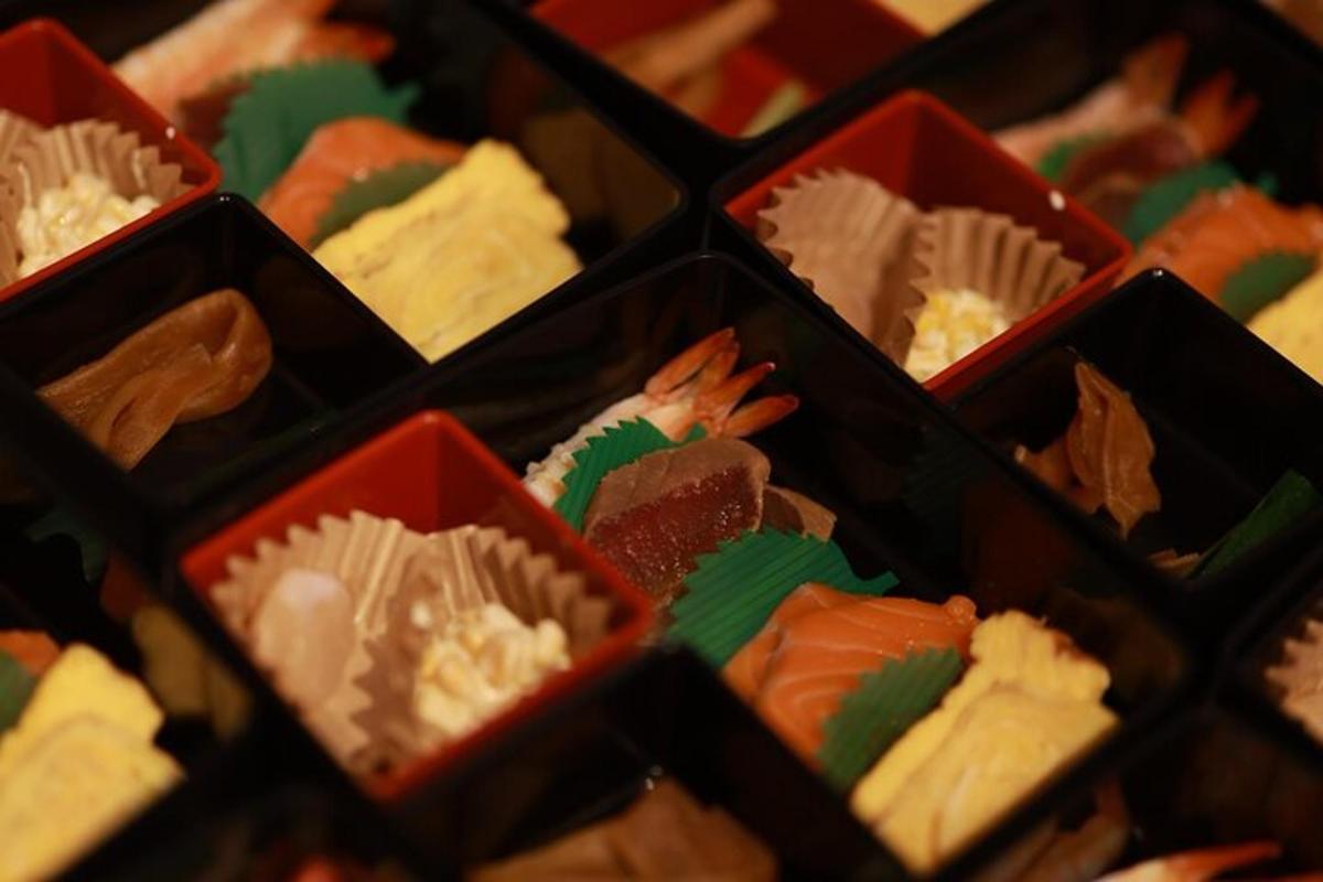 a group of small boxes filled with different types of desserts