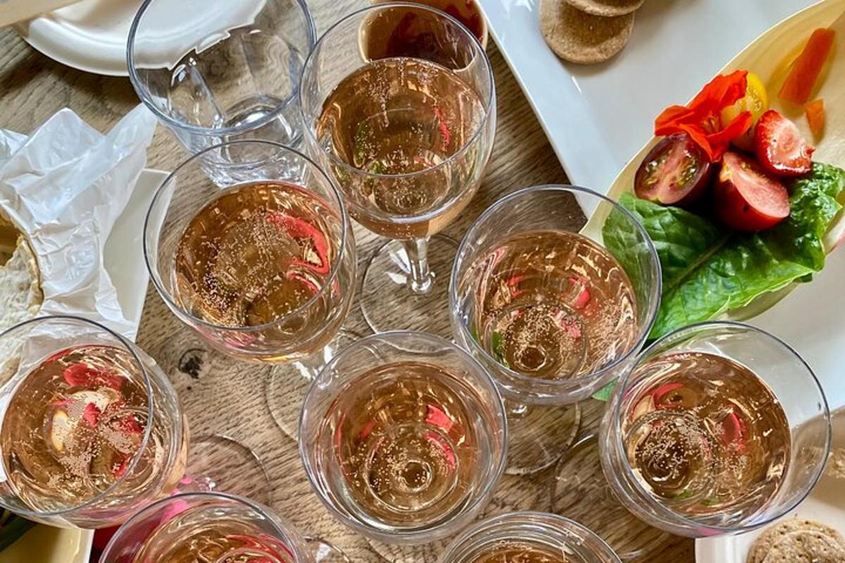 a bunch of glasses of wine on a table