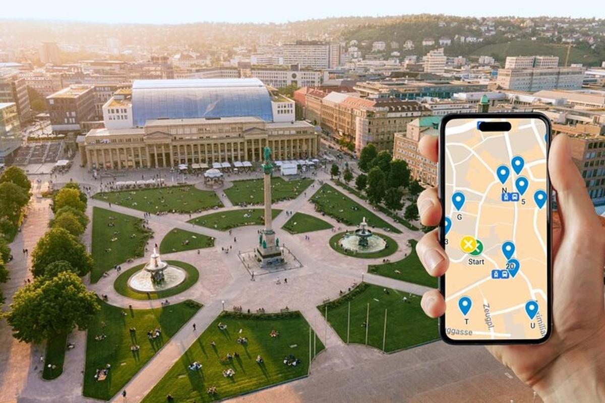 seseorang yang memegang telefon bimbit di hadapan sebuah bandar