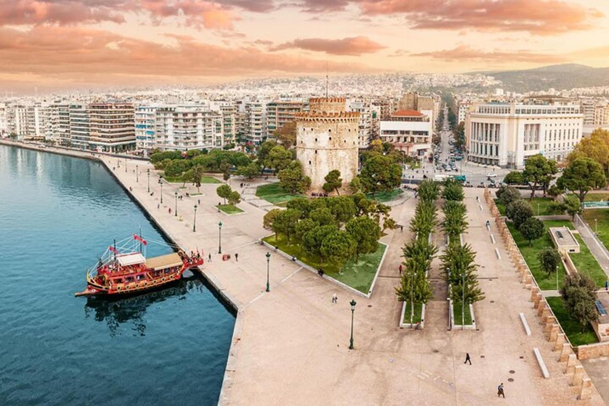 a view of a city with a boat in the water