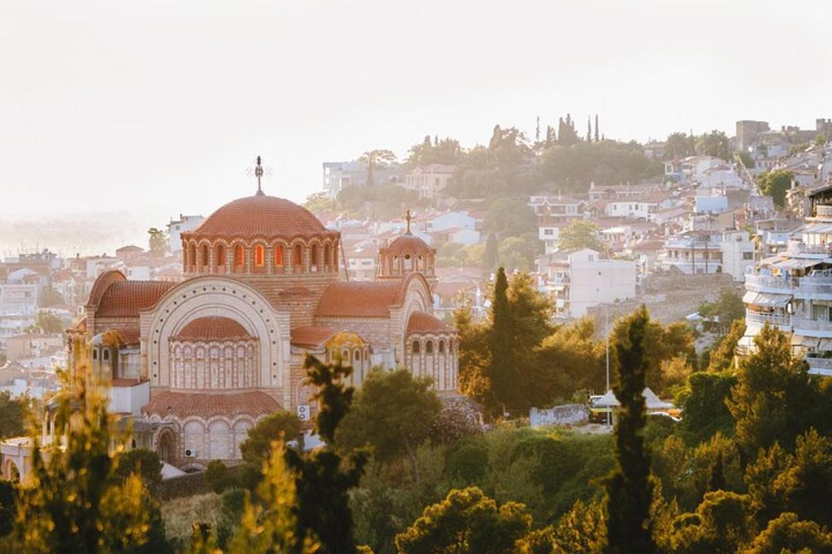 a church on top of a hill in a city