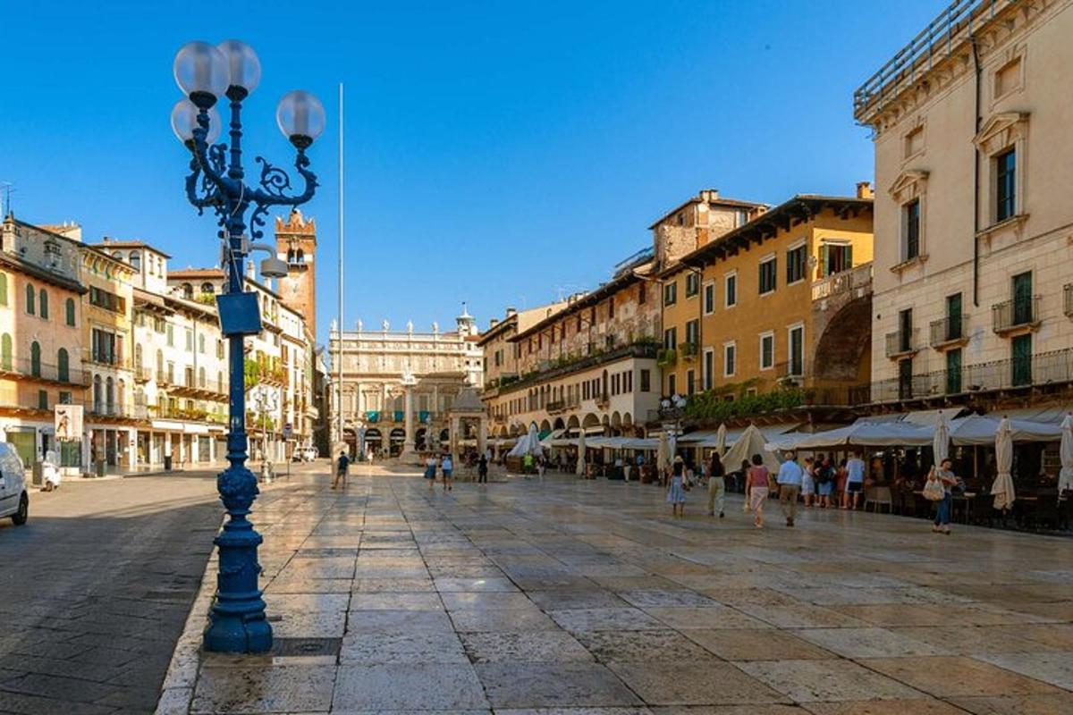 a street light in a city with people walking on a street