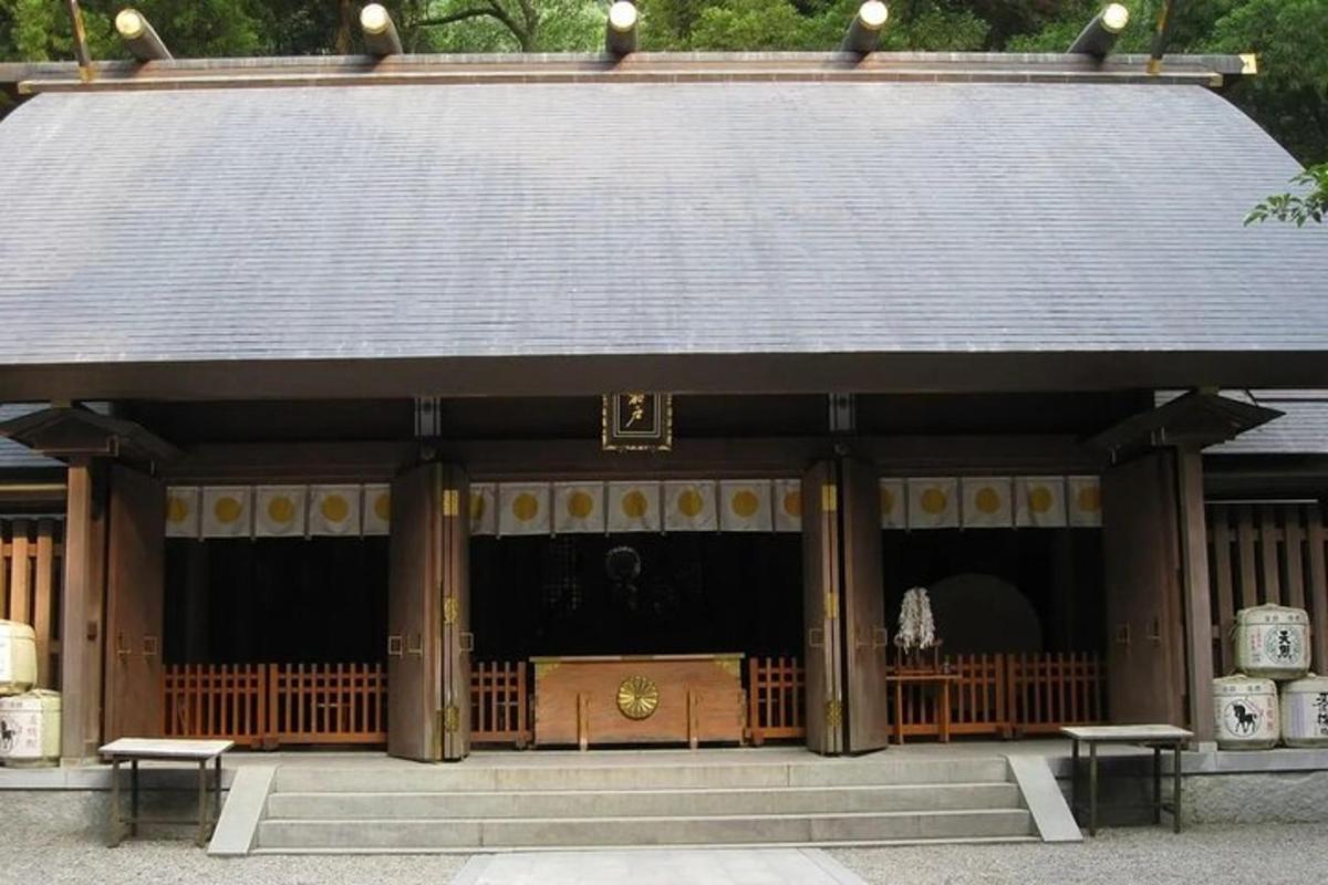 a temple with two benches in front of it