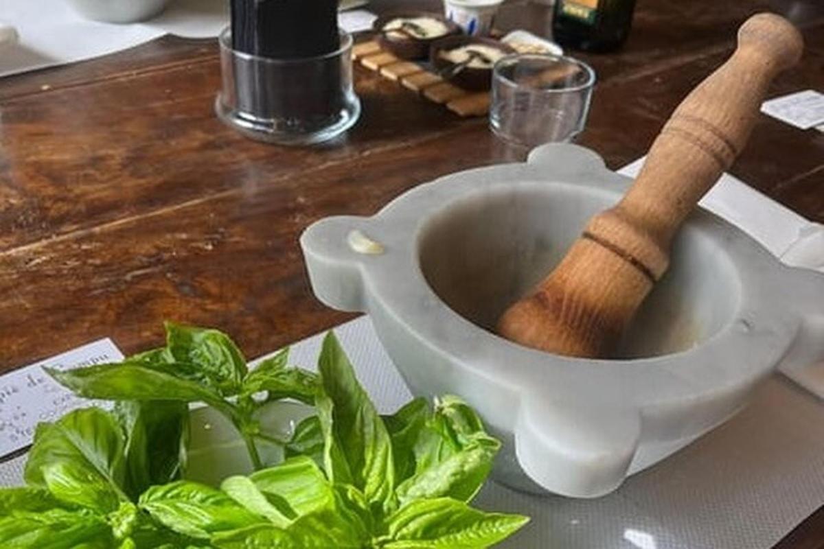 a white toilet bowl with a wooden stick in it