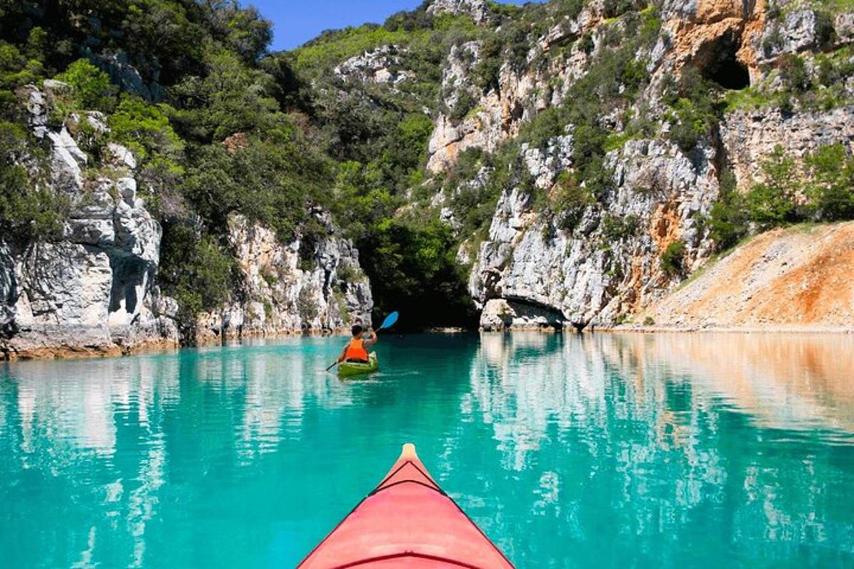 a person in a kayak in a body of water