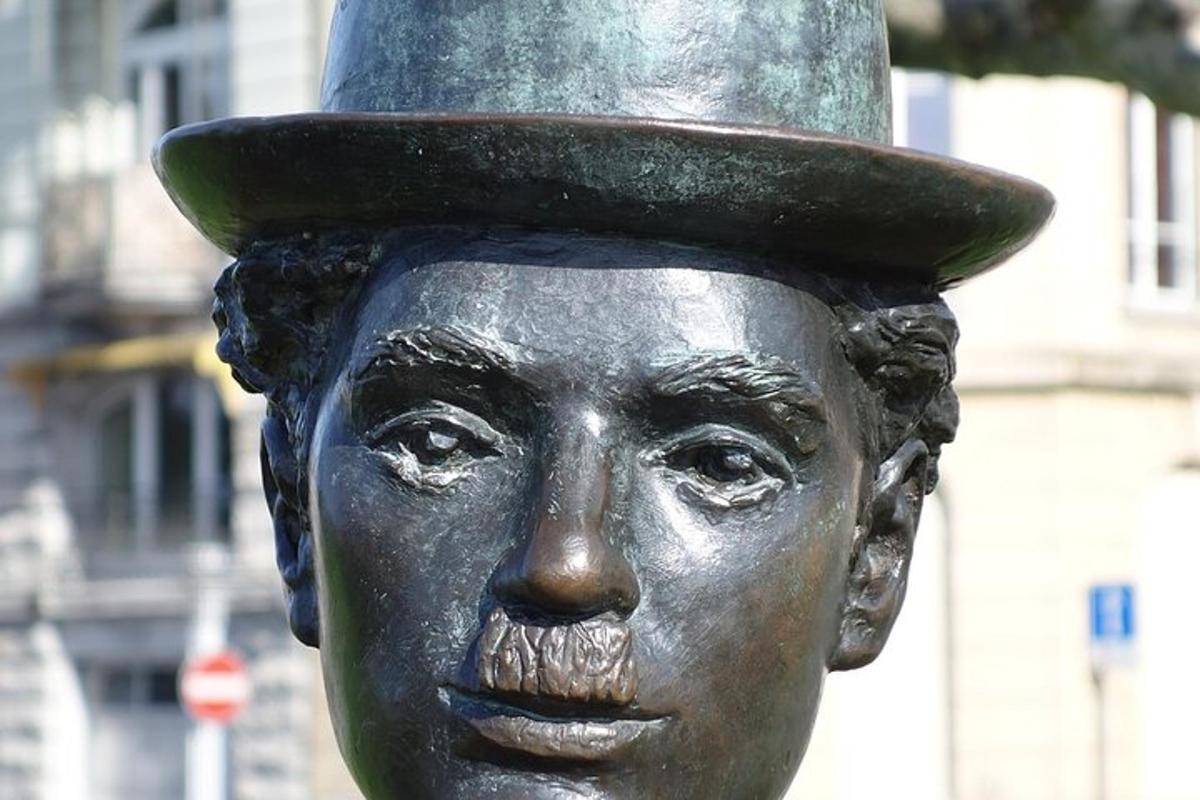 a statue of a woman wearing a top hat