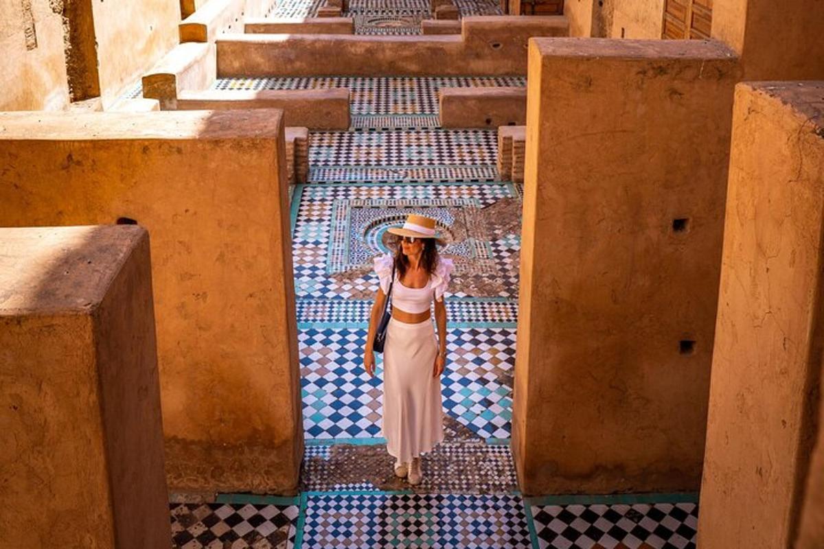 a woman in a hat walking on a tiled floor