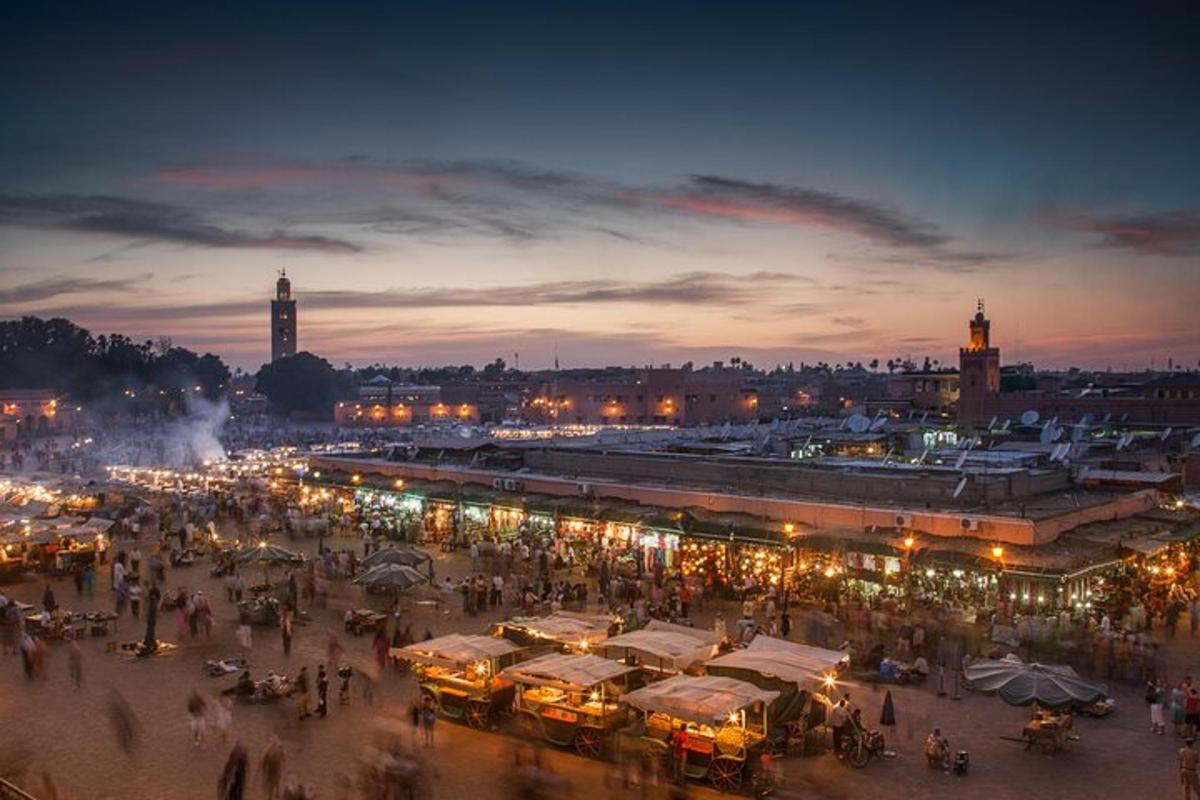 a group of stalls in a market at night