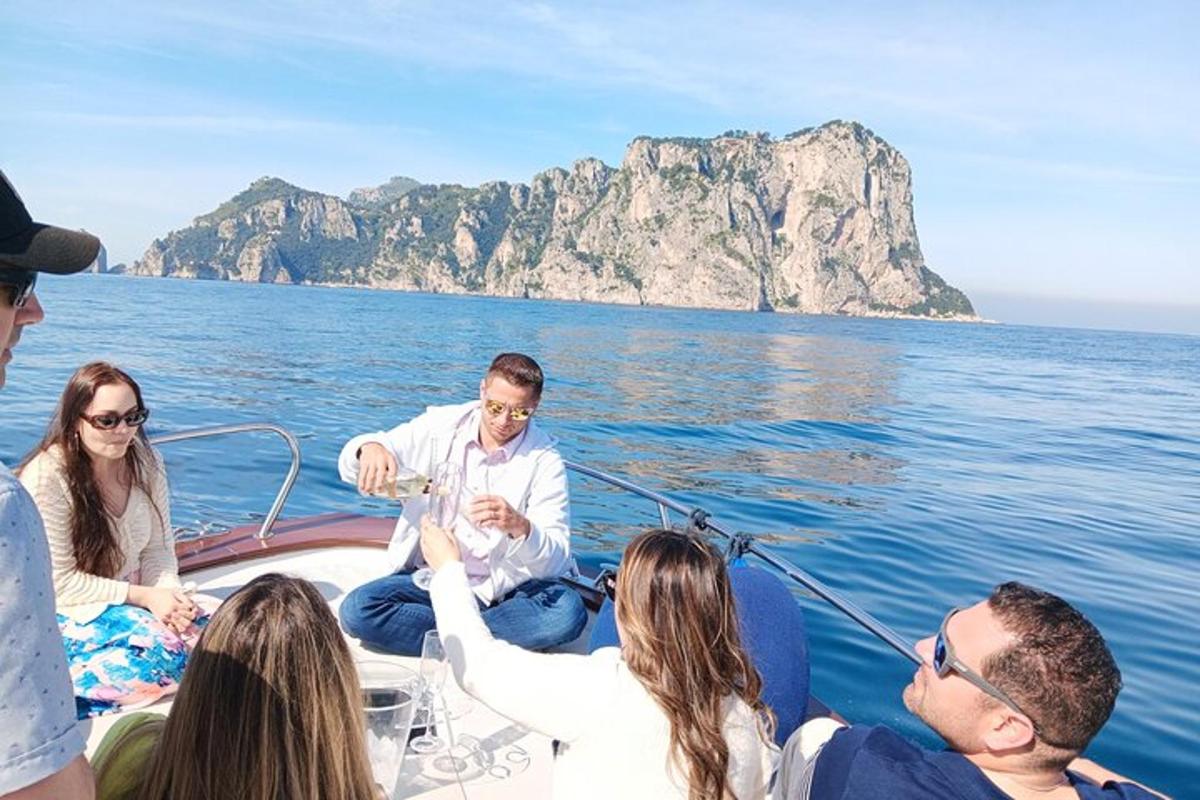 a group of people on a boat in the water