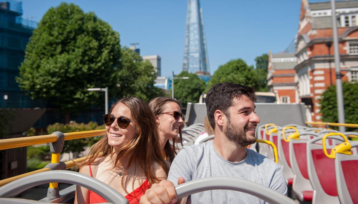 a group of people sitting on a bus