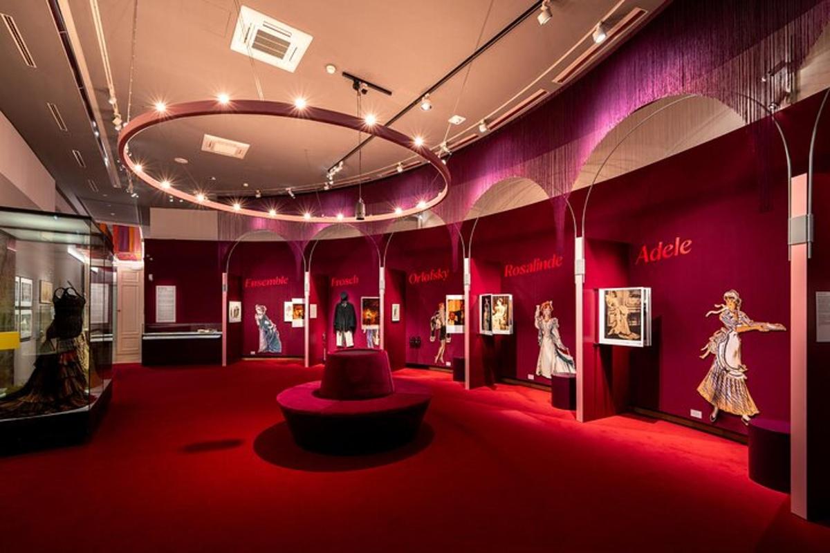 a room with pink walls and a red carpet