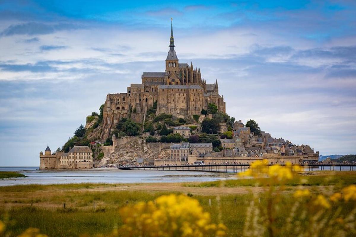 a large castle on an island in the water