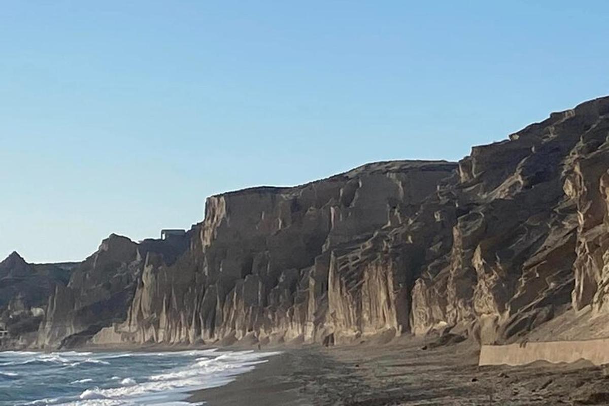 a view of a rocky beach with the ocean