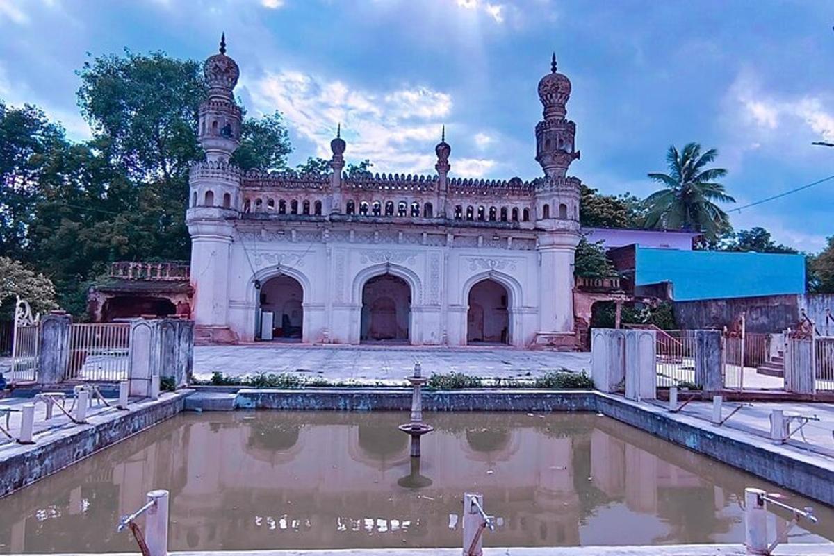 a building with a pool in front of it