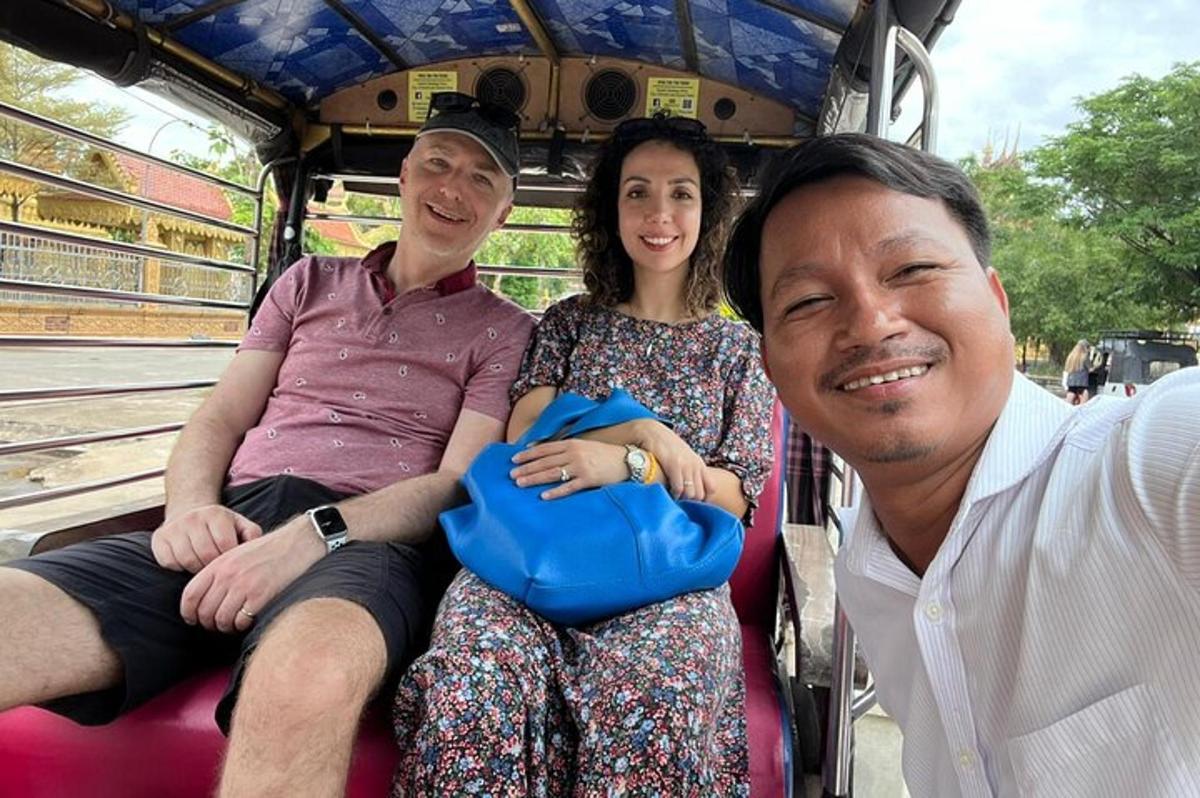 a group of people sitting in the back of a bus