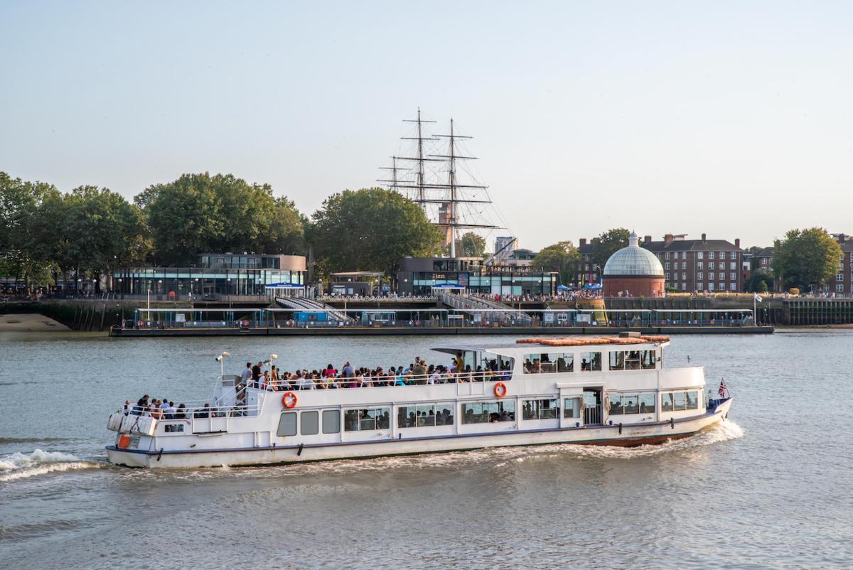 a boat with people on it on the water