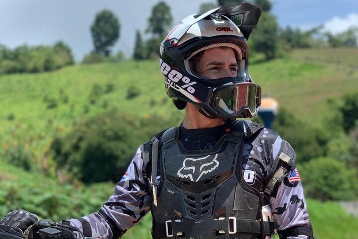 a man wearing a motorcycle helmet and goggles