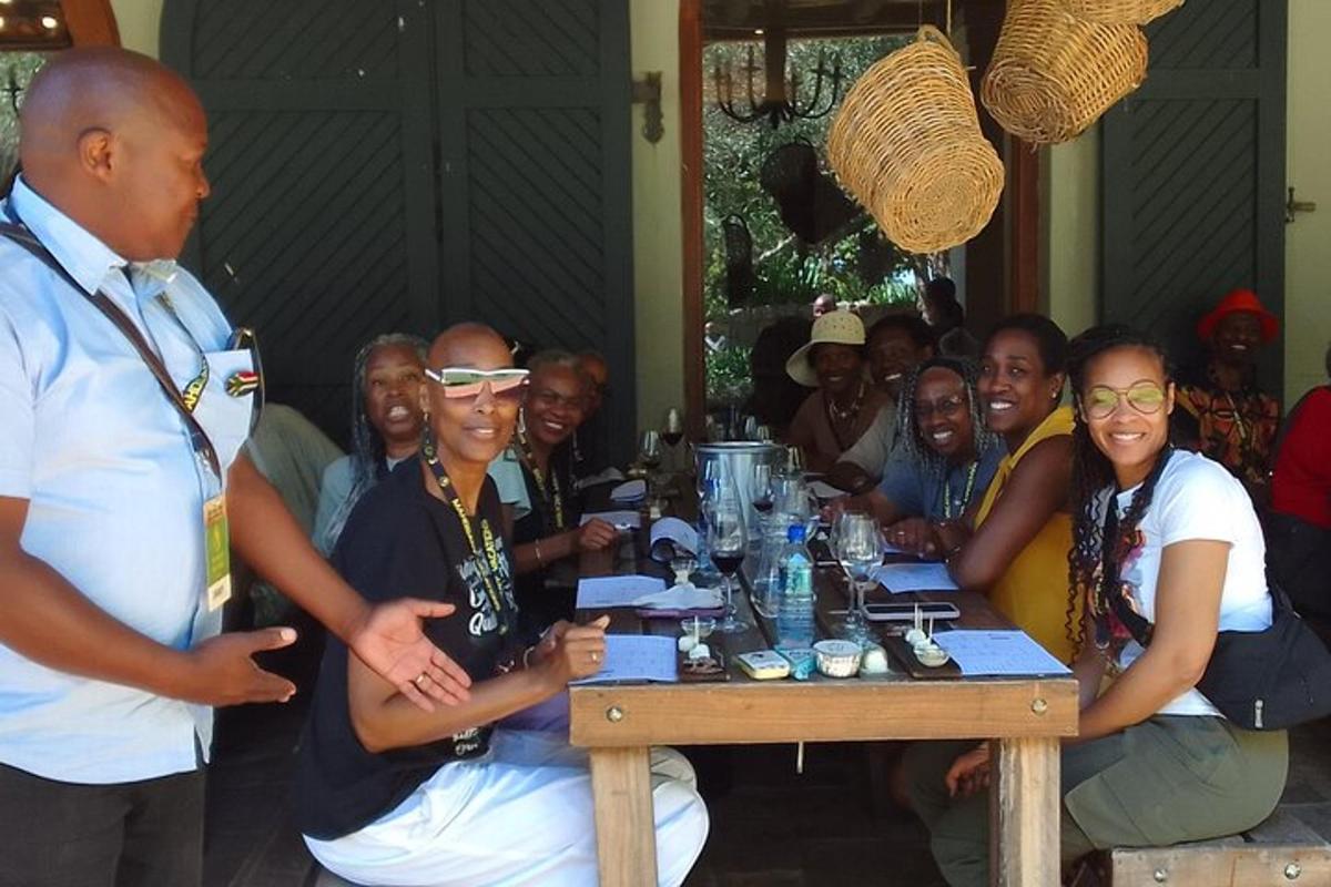 a group of people sitting around a wooden table