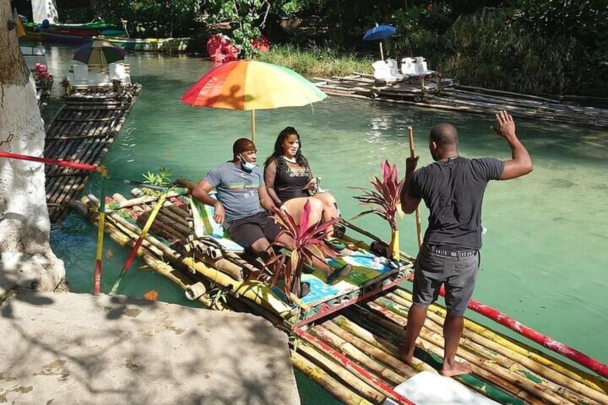 a group of people sitting on a raft in the water