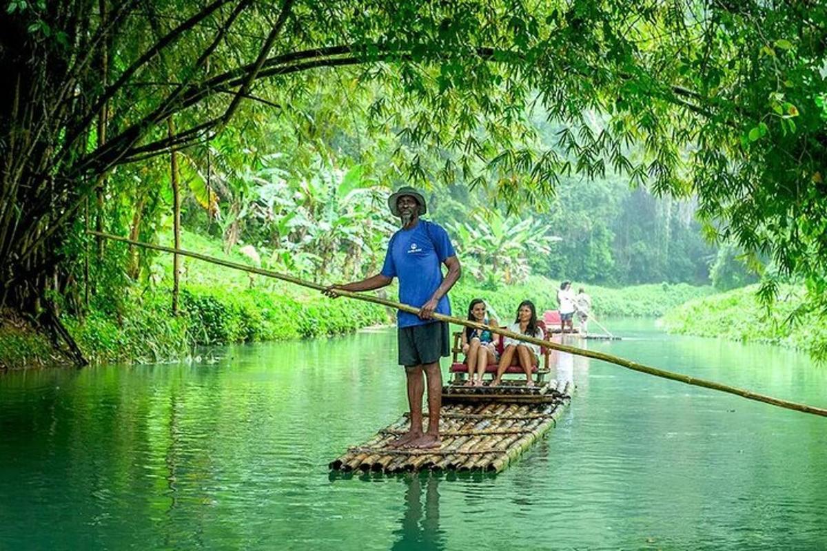 a man is standing on a raft in a river