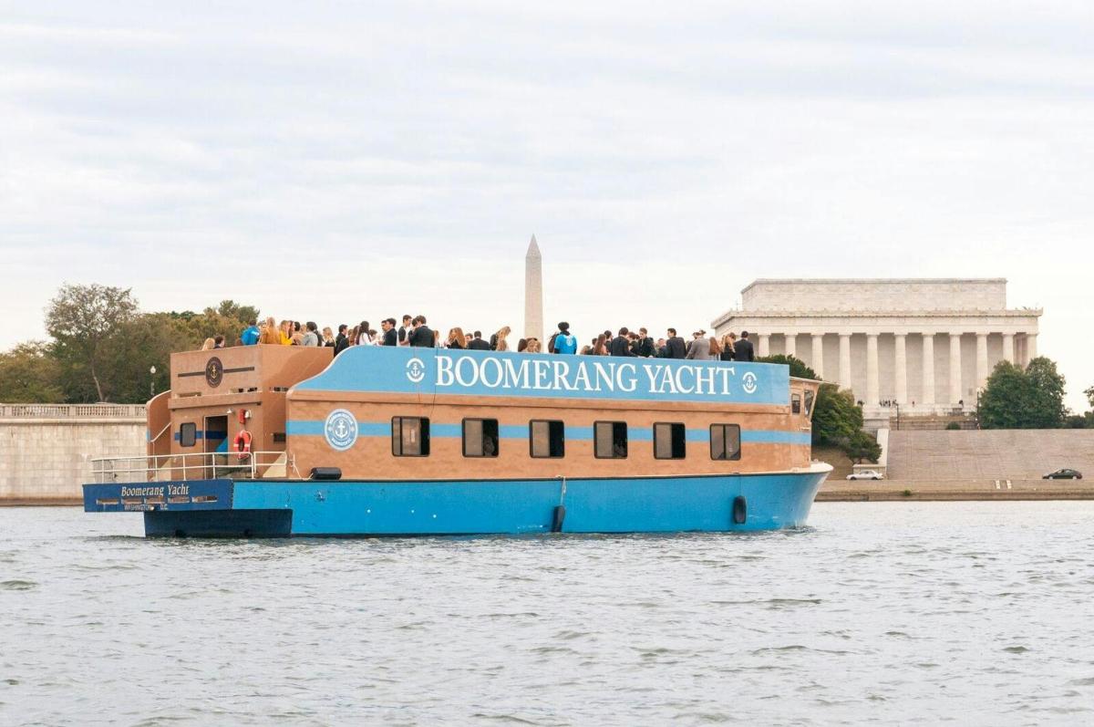 a group of people on a boat on the water