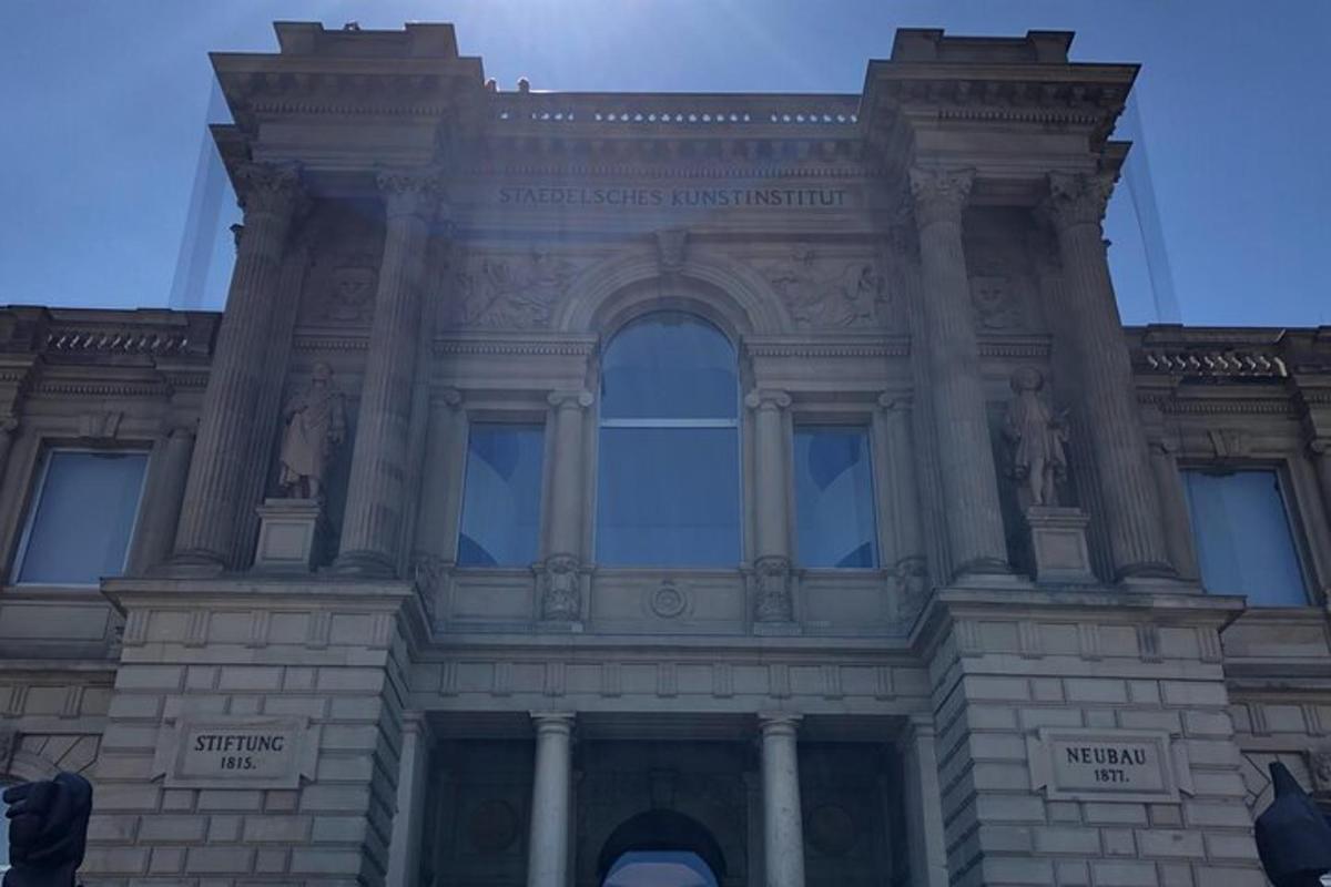 a large stone building with windows on top of it